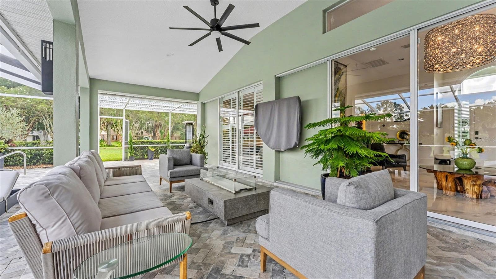 The lanai is comfortably sized and easily allows for a full seating group and a separate dining area - perfect for entertaining - 3417 BARLEY CT, LAKELAND