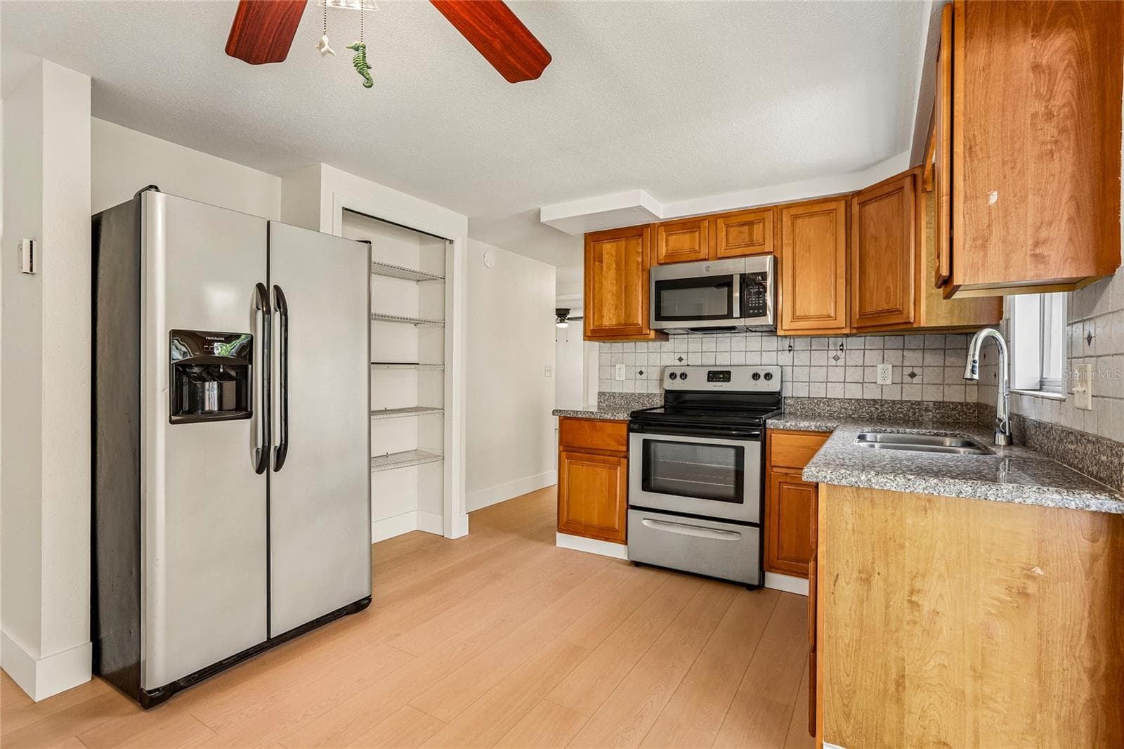 Single Family Residence at 1535 SENTINEL ST, HOLIDAY, photo 11 of 32