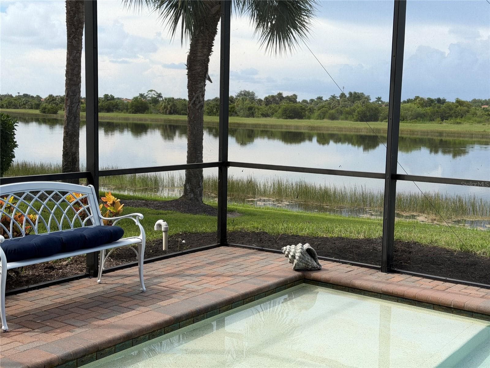 New Landscaping reveals the stunning view of the Greenbelt and golf course - 23781 WAVERLY CIR, VENICE