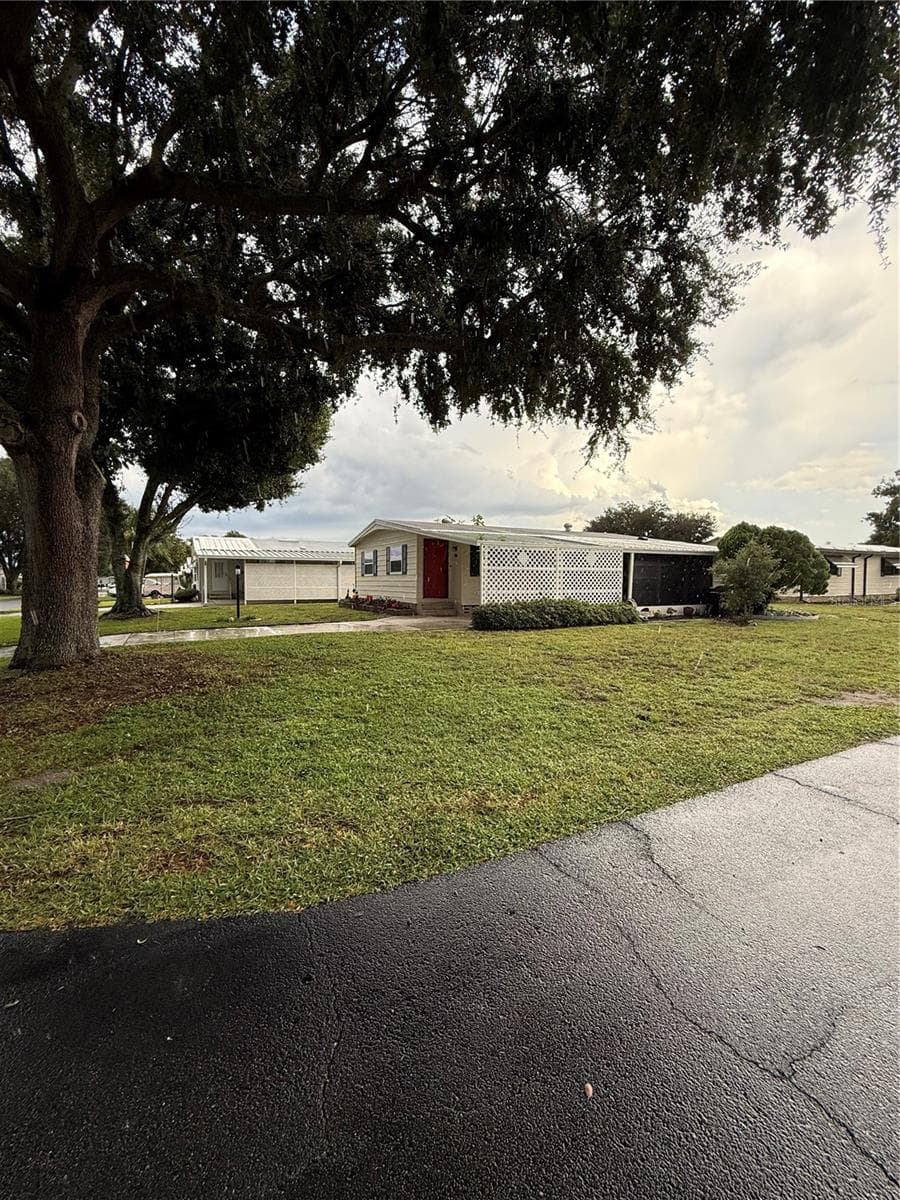 Beautiful corner lot - 6204 KNOTTY PINE DR SE, WINTER HAVEN