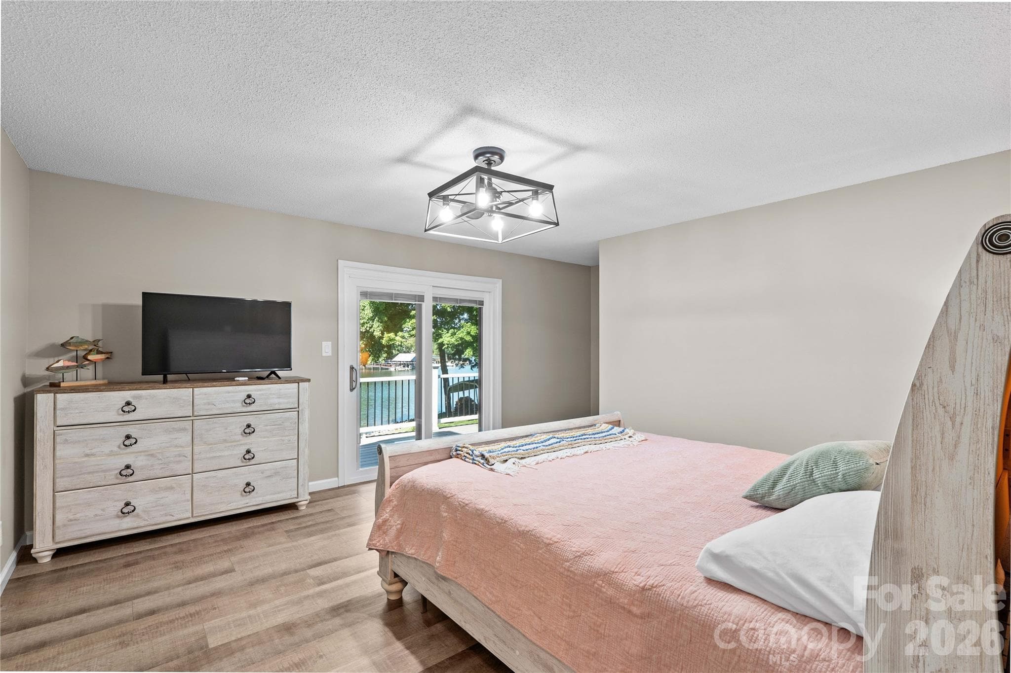 Bedroom # 1 with lake view - 150 Shady Cove Drive, Troutman