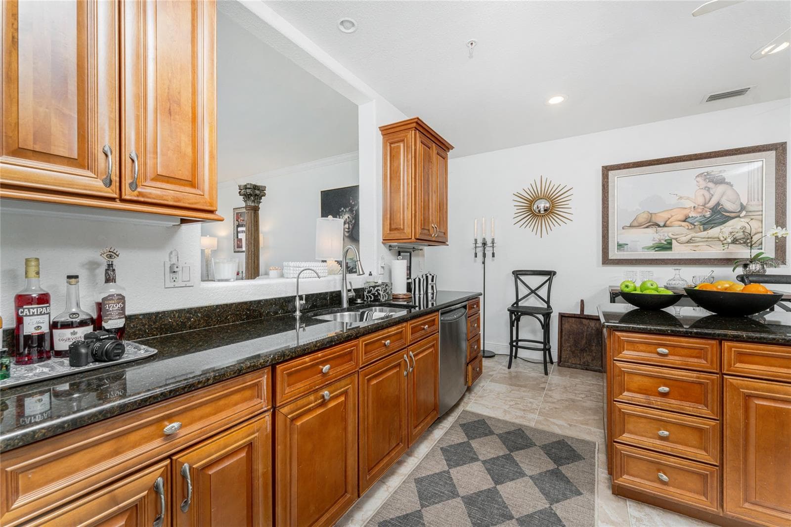 Beautiful solid wood cabinetry with soft close drawers cast a timeless understated warm ambiance throughout the home. - 95 N MARION CT #135, PUNTA GORDA