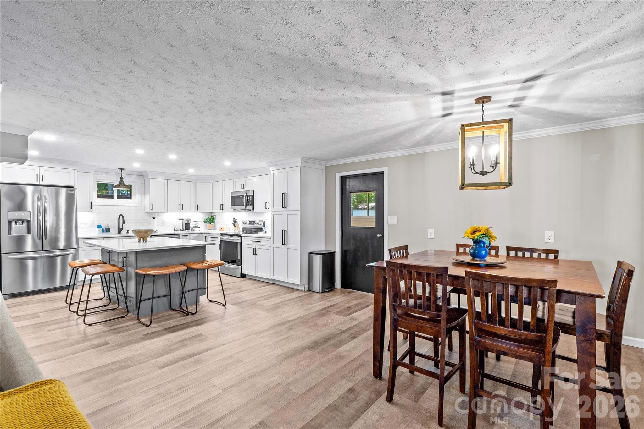 Dining area and kitchen - 150 Shady Cove Drive, Troutman