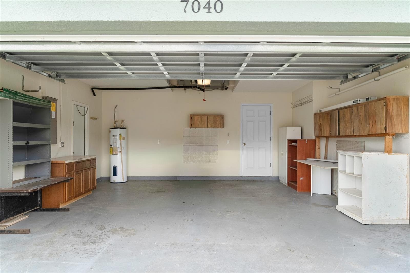 2 Car Garage - 7040 FRASCATI LOOP, WESLEY CHAPEL
