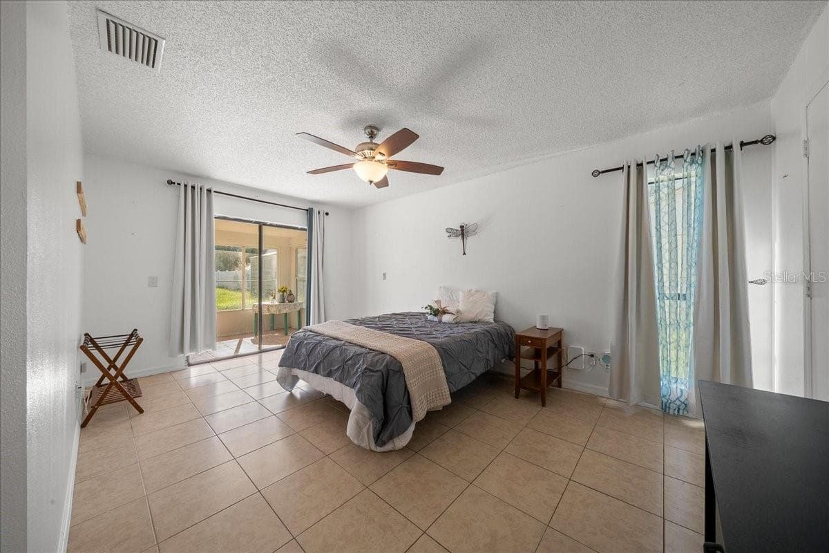 Glass Sliders to Lanai in Primary - 14993 SW 38TH CIR, OCALA