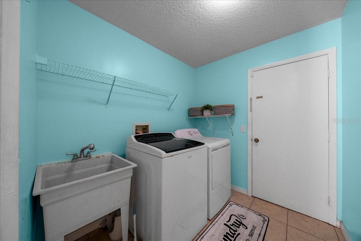 Laundry Room features Utility Sink - 14993 SW 38TH CIR, OCALA
