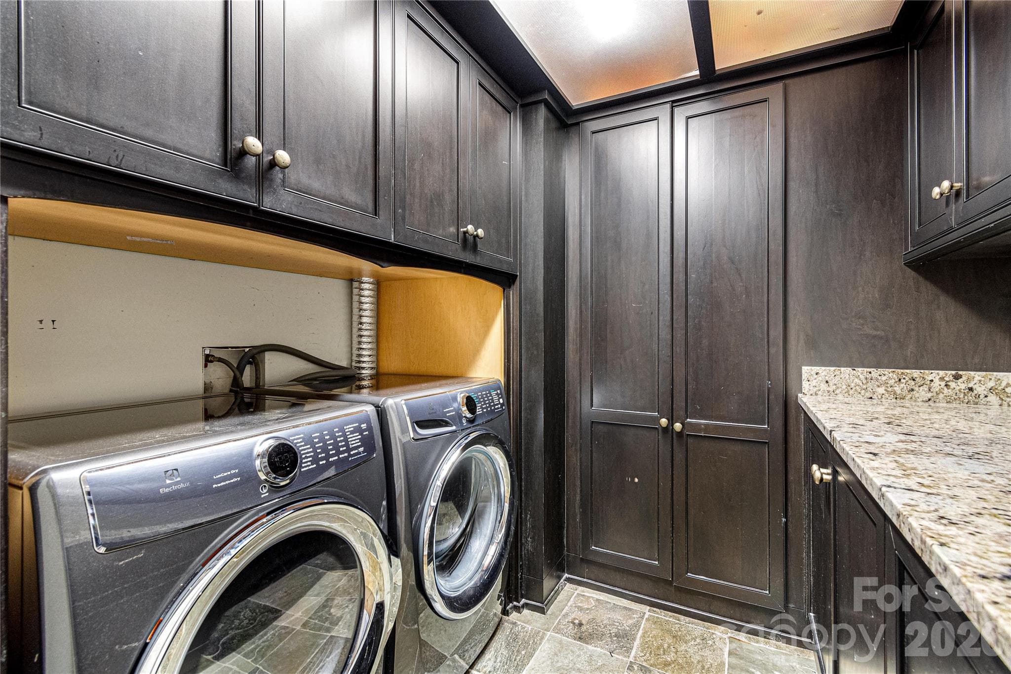 Downstairs laundry room - 419 Summit Trail, Banner Elk