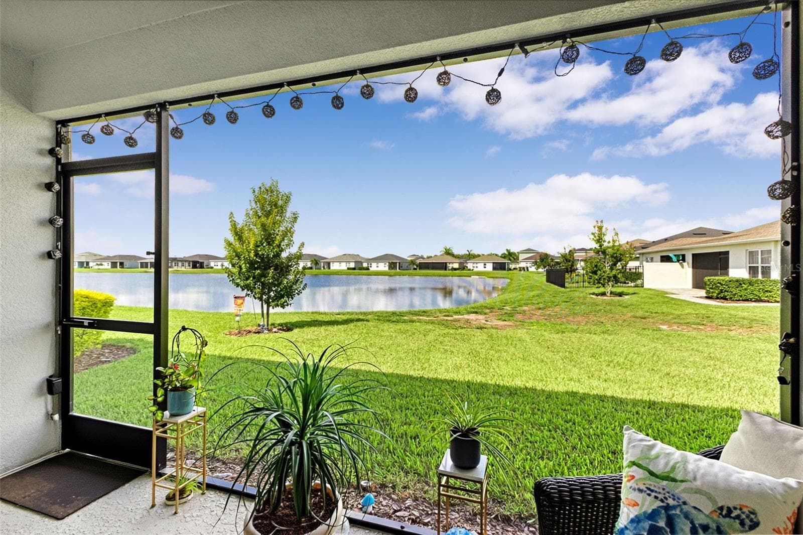 screen lanai - 16363 COCONUT PALM DR, PORT CHARLOTTE