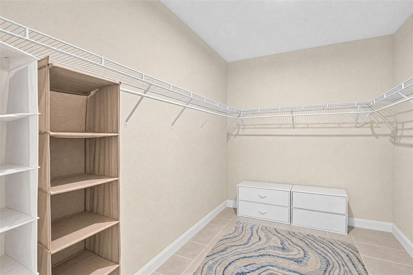 oversized primary walk in closet - 16363 COCONUT PALM DR, PORT CHARLOTTE