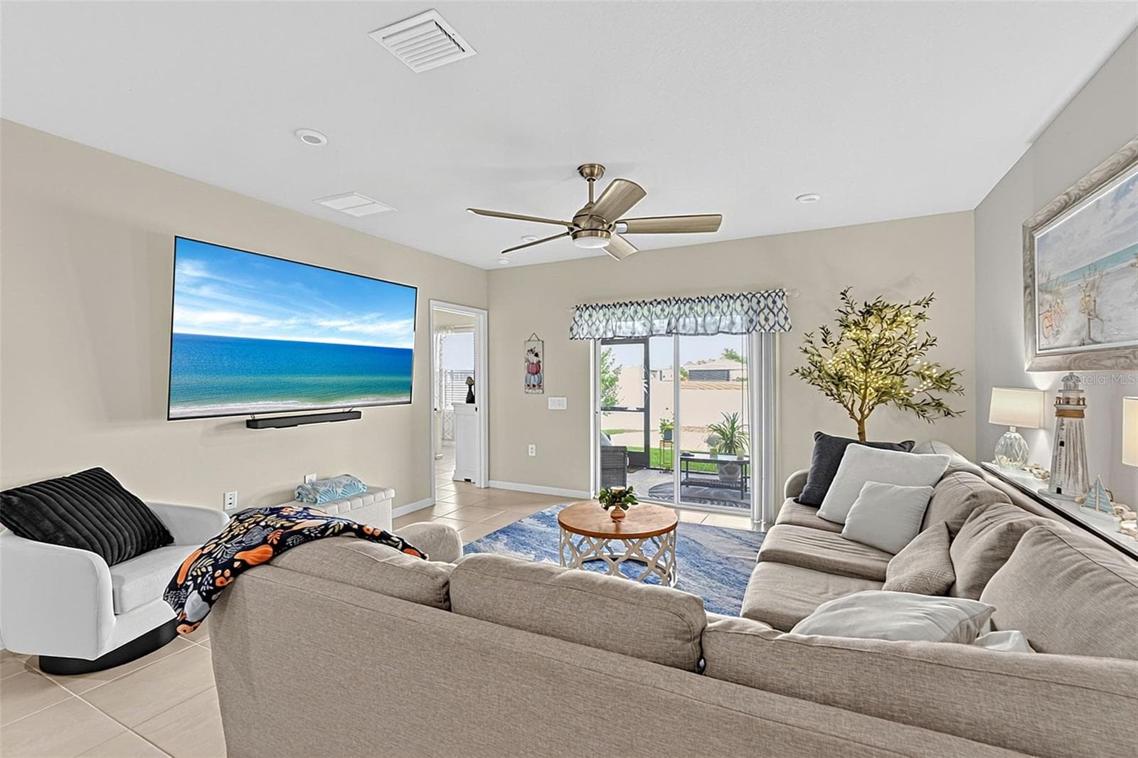 living room - 16363 COCONUT PALM DR, PORT CHARLOTTE