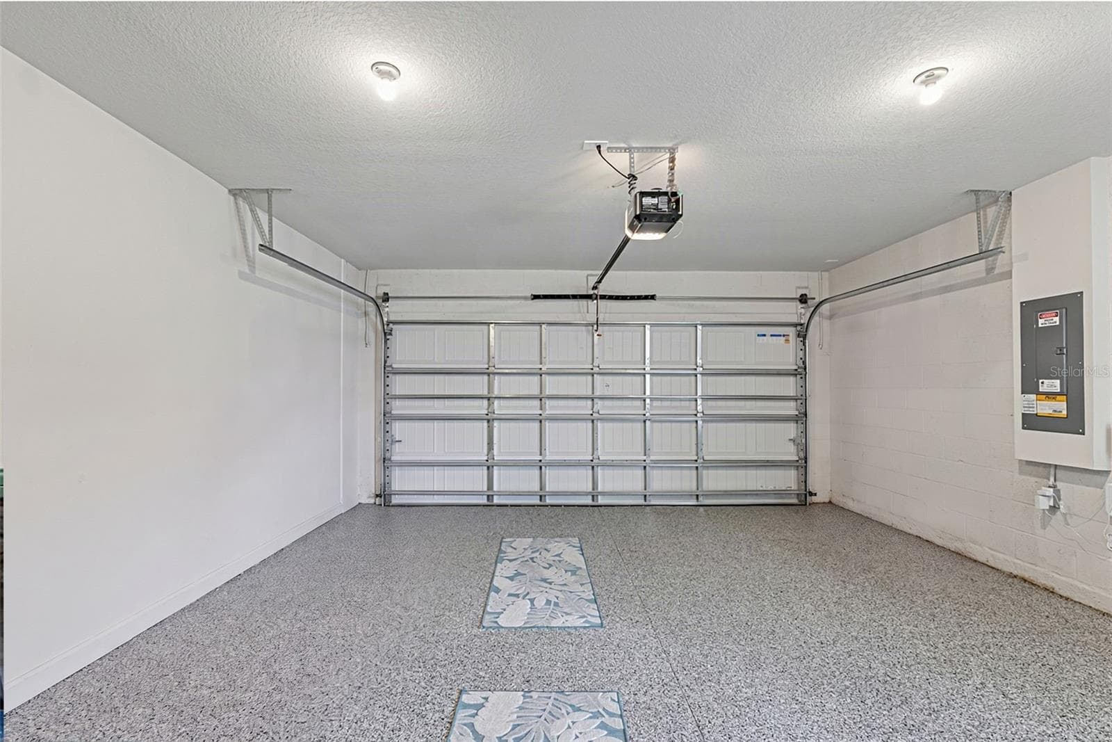 garage w/ epoxy flooring - 16363 COCONUT PALM DR, PORT CHARLOTTE