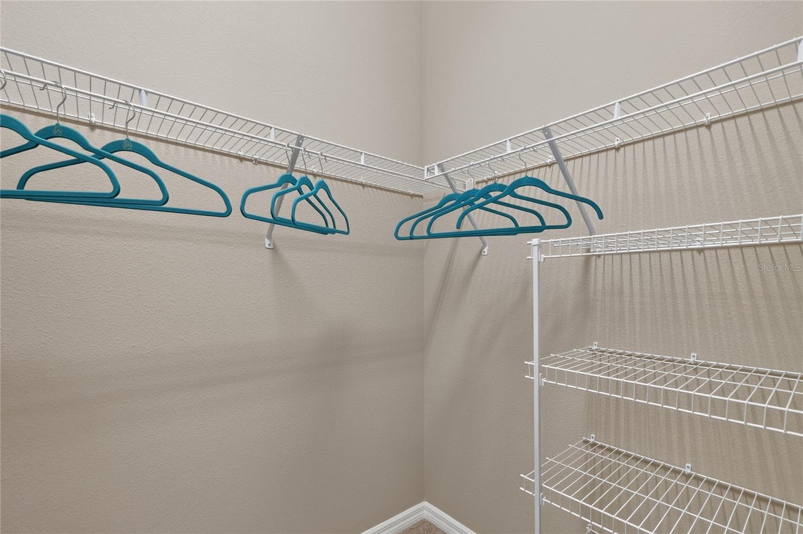 PRIMARY WALK IN CLOSET - 5825 FLINT LOOP, THE VILLAGES