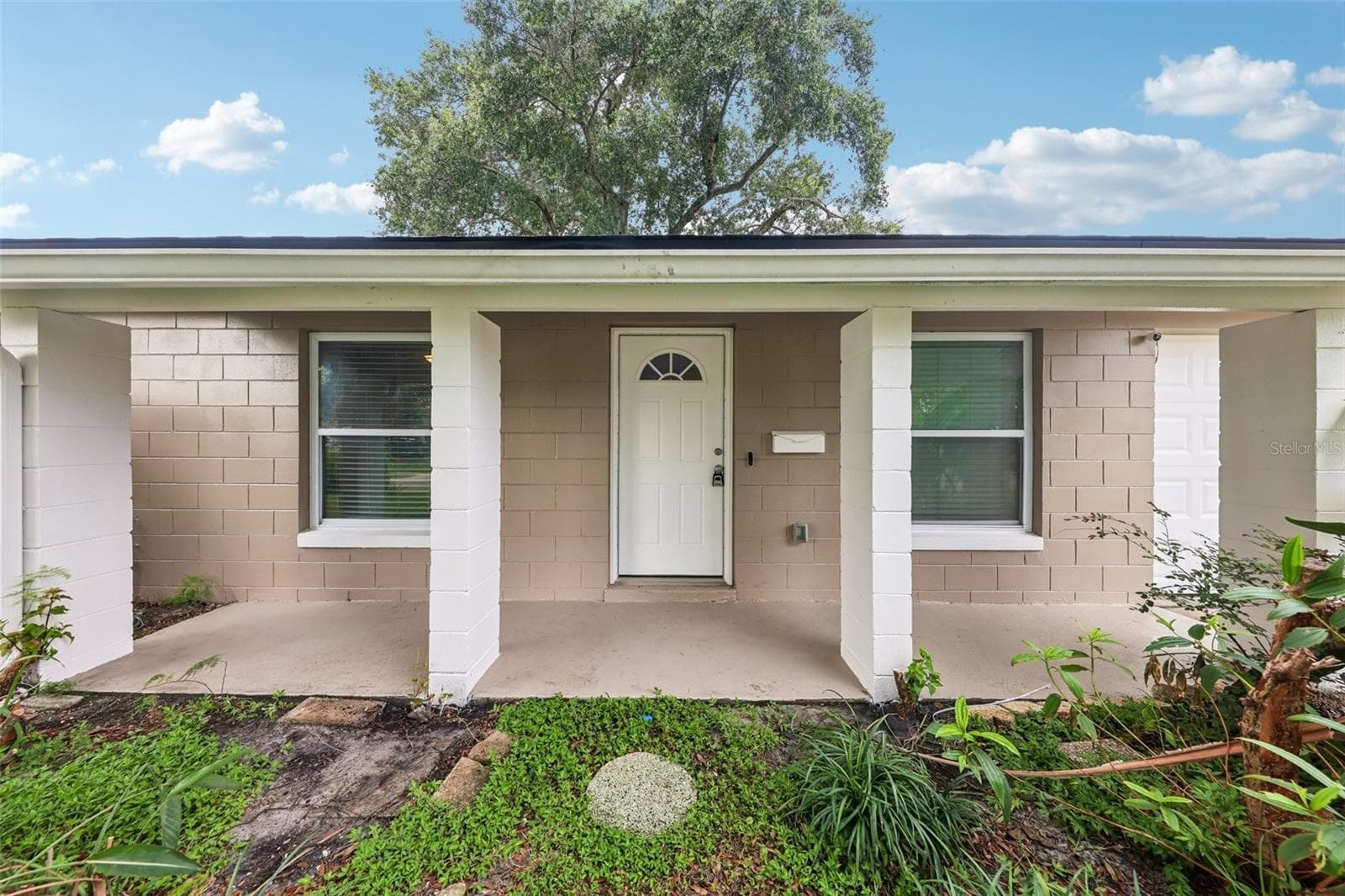 Covered front porch entry. - 6698 RIVO ALTO AVE, ORLANDO