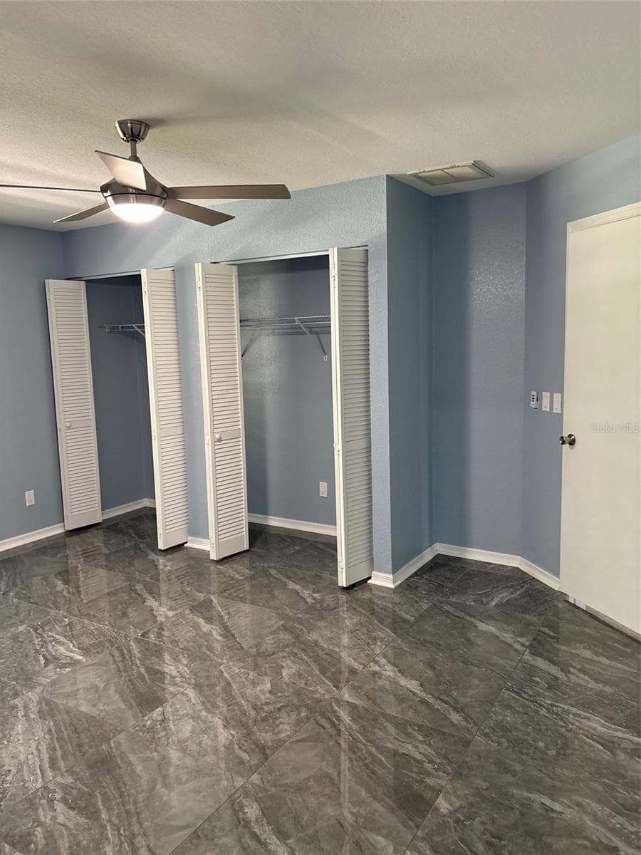 Primary bedroom closets - 19005 SW 98TH LOOP, DUNNELLON