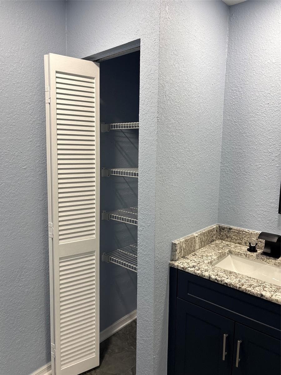 Primary bathroom linen closet - 19005 SW 98TH LOOP, DUNNELLON
