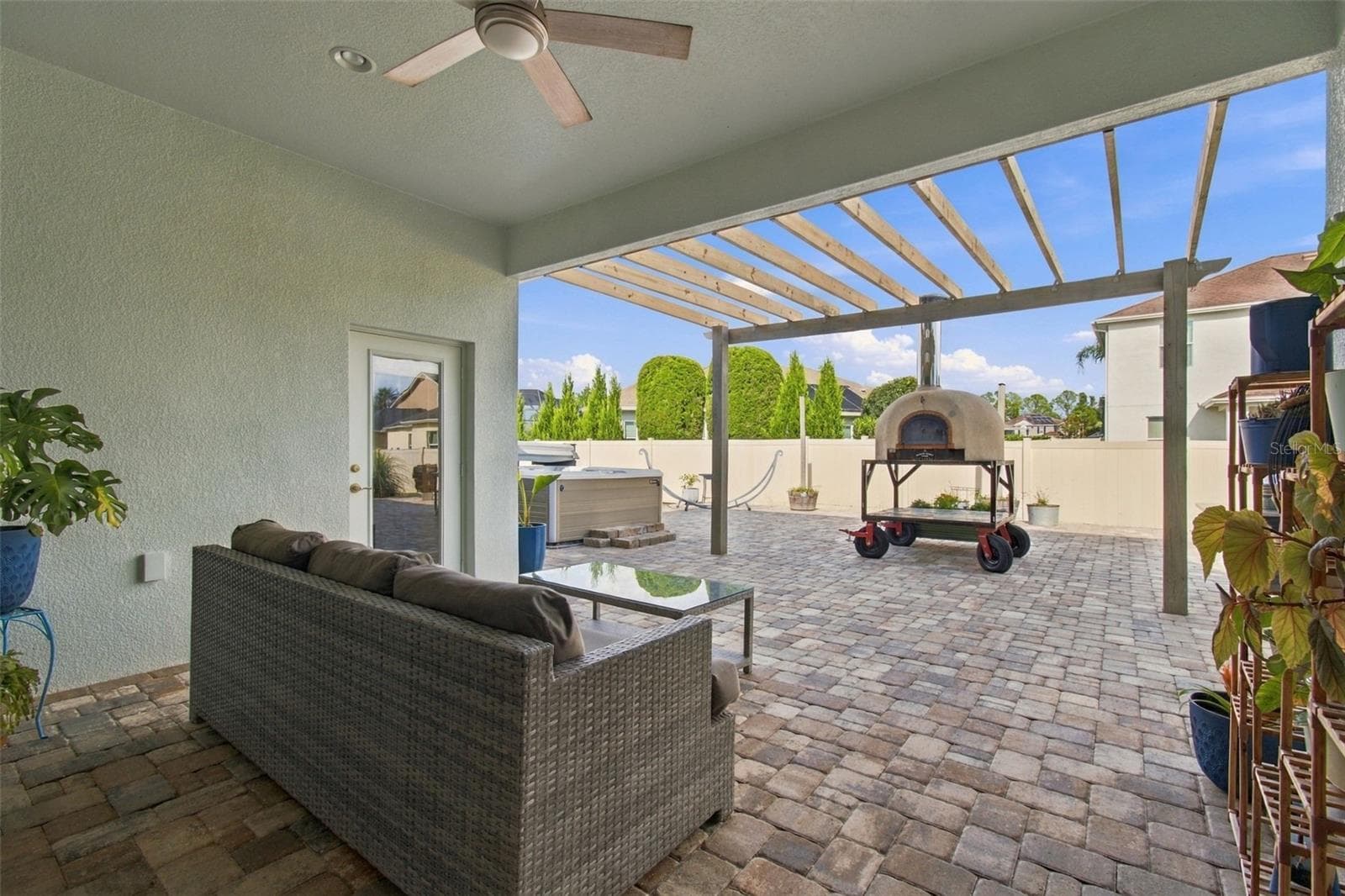 Lanai plus over 1100 square feet of pavered patio - 3335 STONEGATE FALLS DR, LAND O LAKES