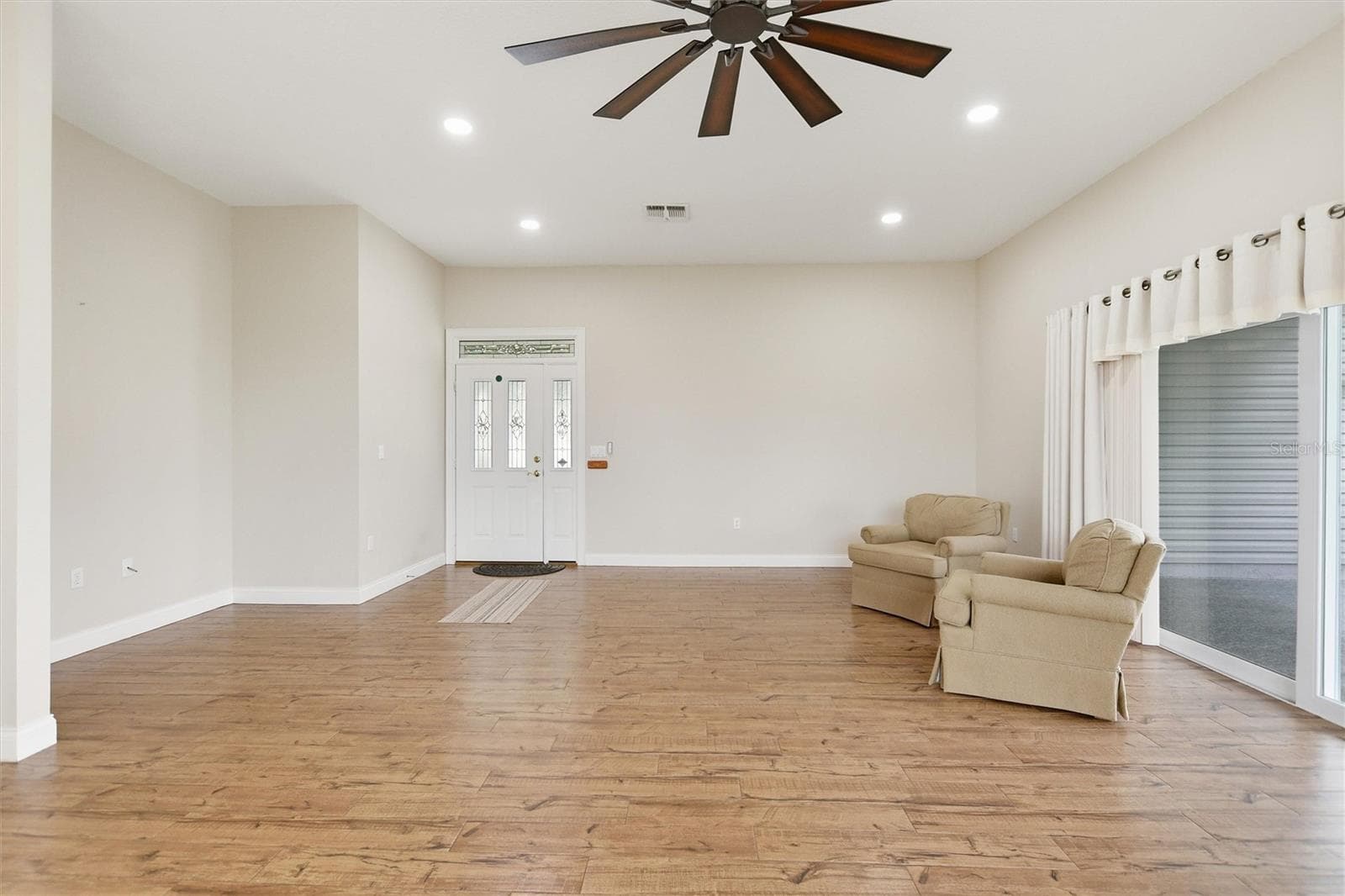 Large open living room - 1097 CARAVAN LOOP, POLK CITY