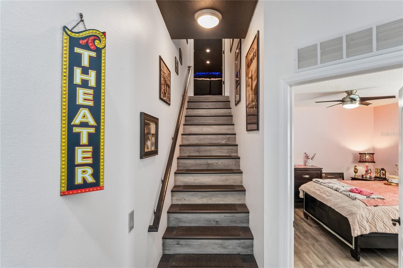 Staircase to Theatre Room/4th bedroom - 11309 LAPWING RD, WEEKI WACHEE