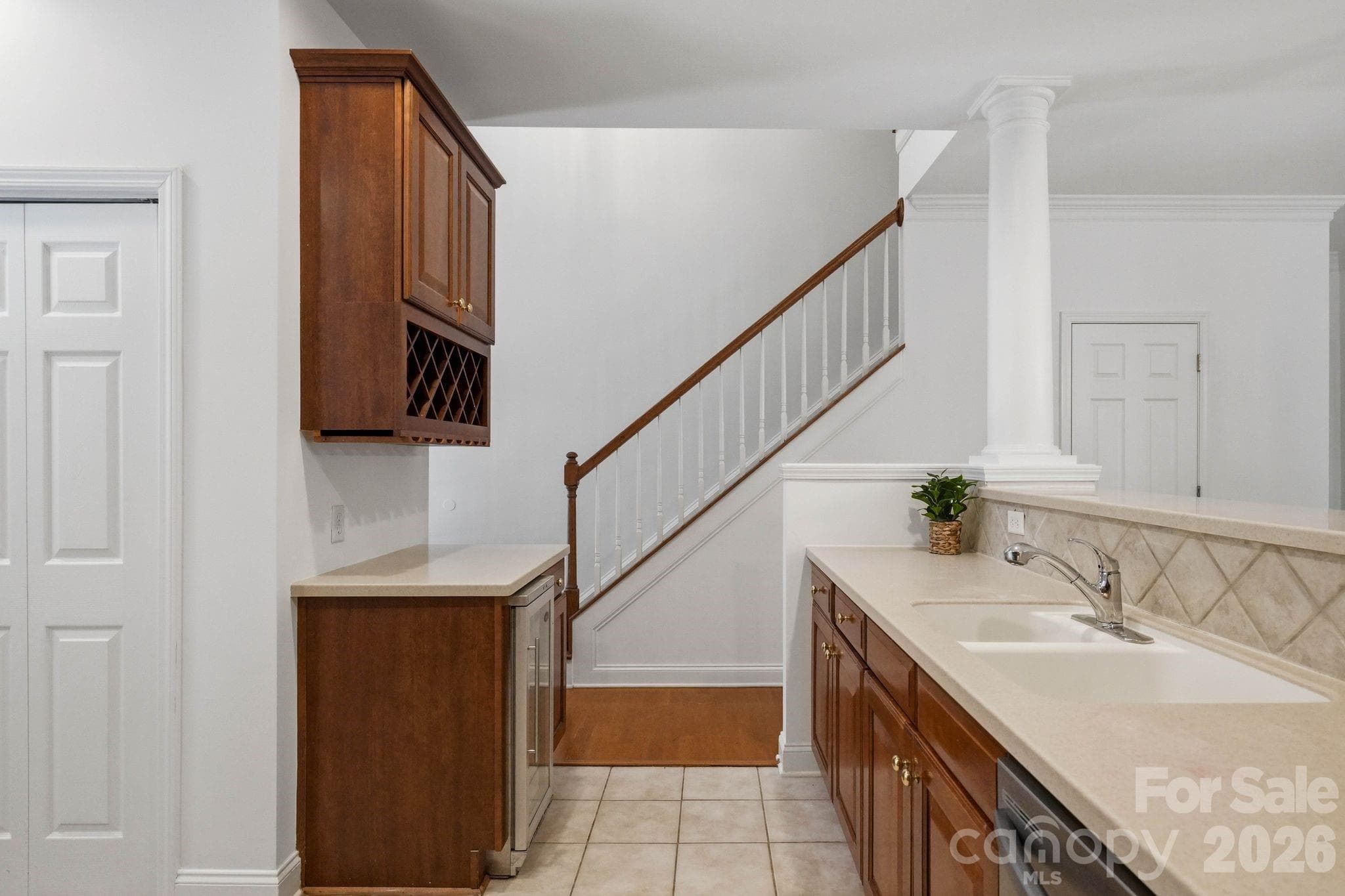 Dedicated beverage and wine area adds convenient serving and storage space. - 18810 Cloverstone Circle, Cornelius