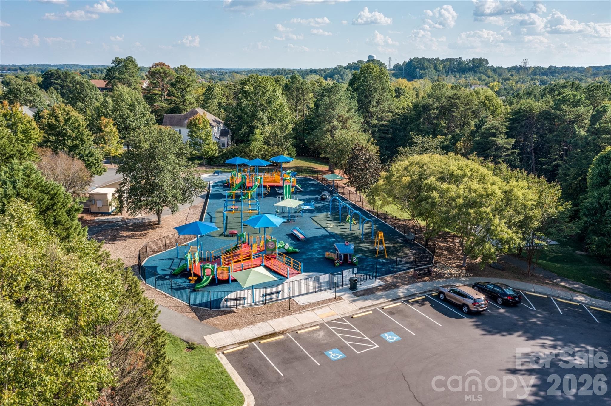 Amazing Trailhead Park offers a fun playground and access to miles of walking trails—perfect for getting outside and exploring all that Tega Cay has to offer! - 3022 Point Clear Drive, Tega Cay