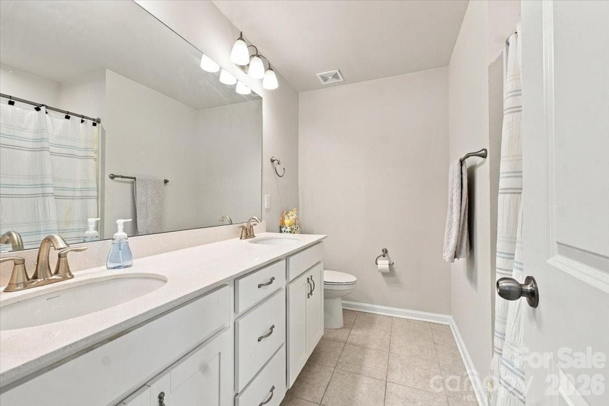 secondary full bath upstairs - 8036 Overmeadow Lane, Charlotte