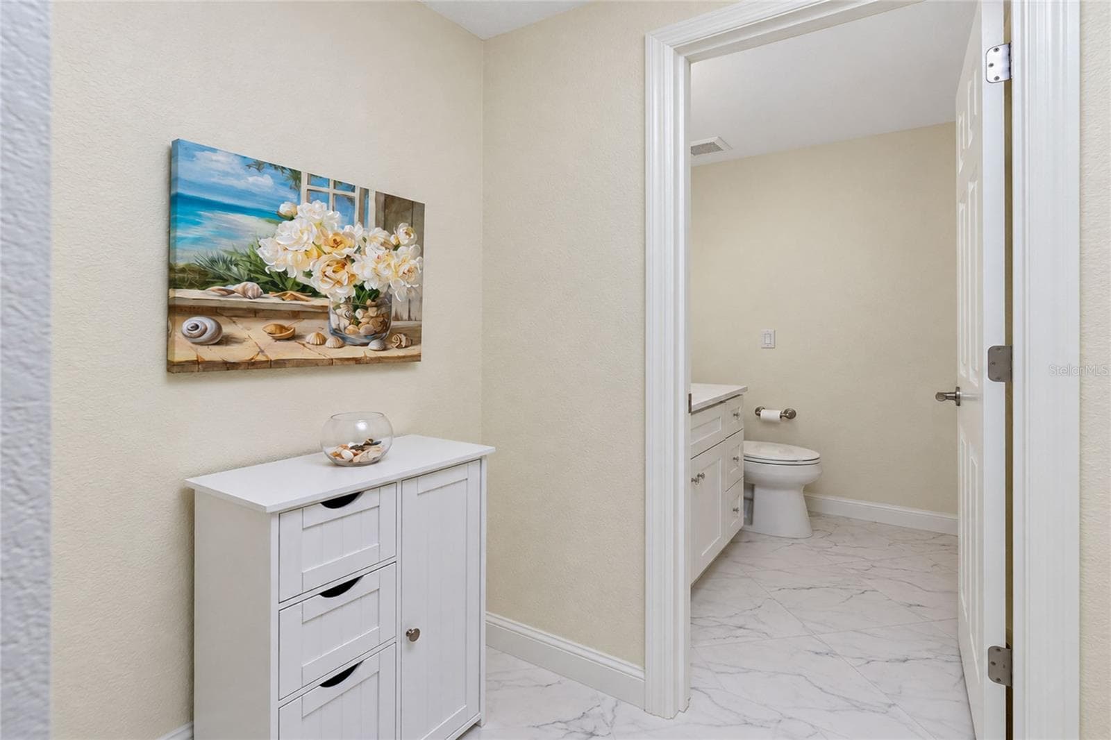 HALF BATH OFF OF LIVING AREA - 1601 PARK BEACH CIR #136/18, PUNTA GORDA