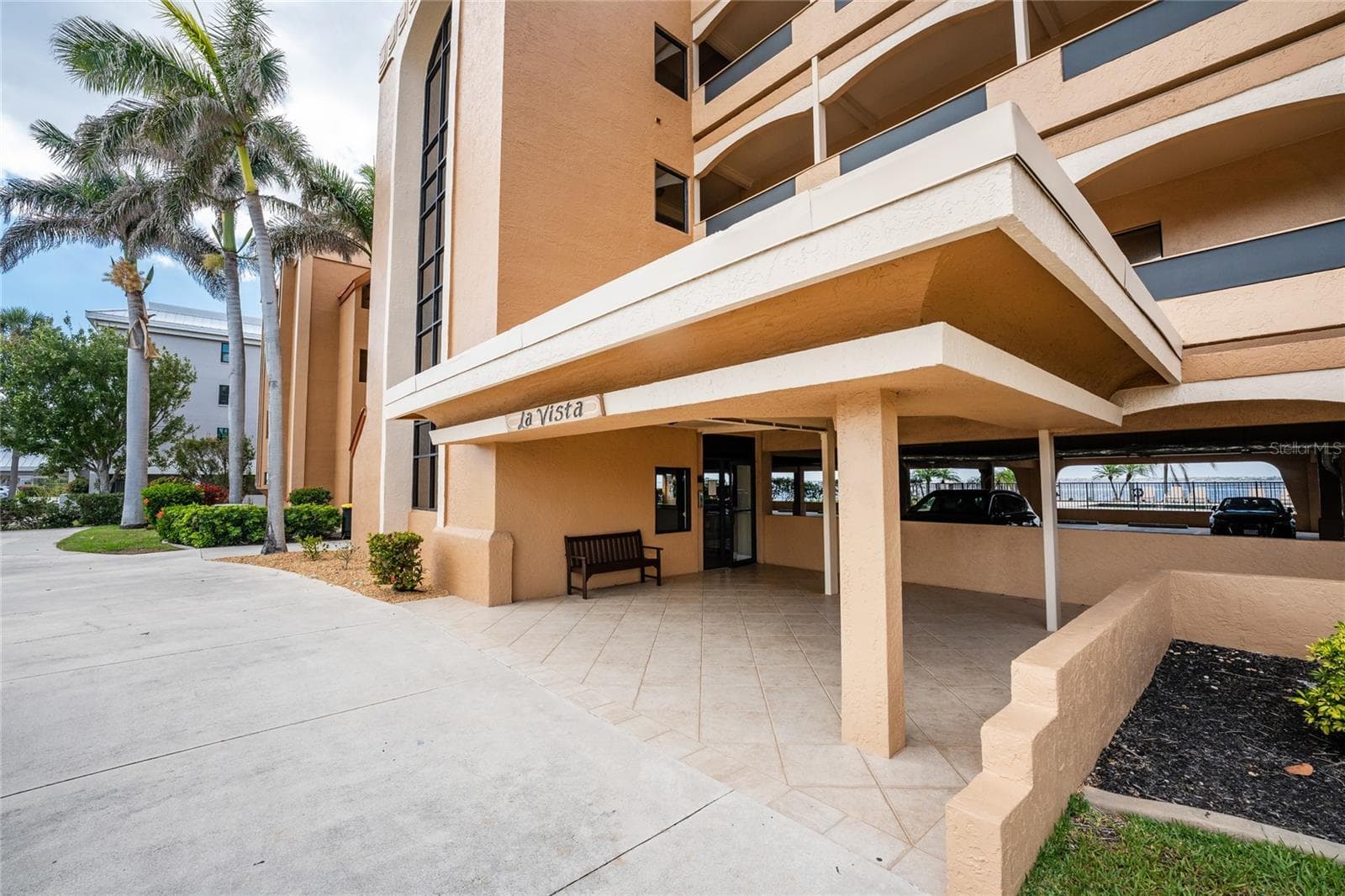 FRONT ENTRY PORTICO - 1601 PARK BEACH CIR #136/18, PUNTA GORDA