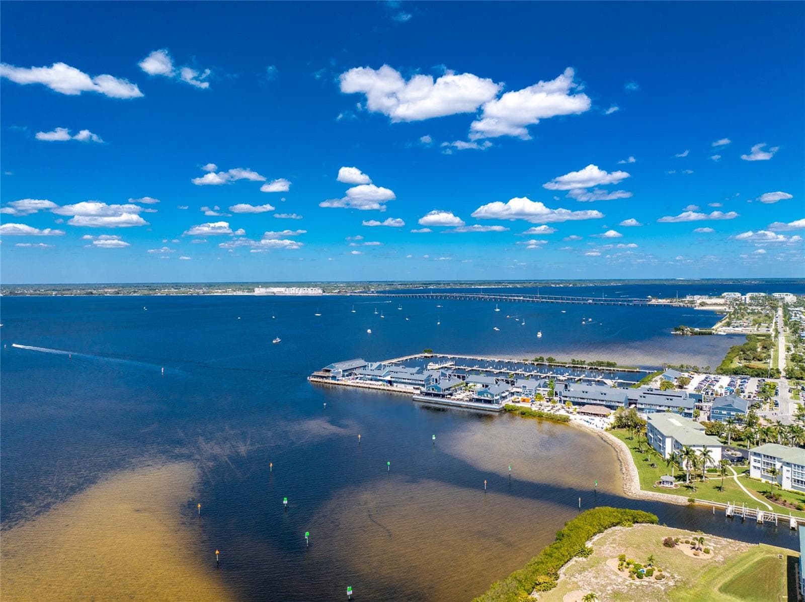 VIEWS OF FISHERMEN'S VILLAGE AND BOATING ACTIVITY - 1601 PARK BEACH CIR #136/18, PUNTA GORDA