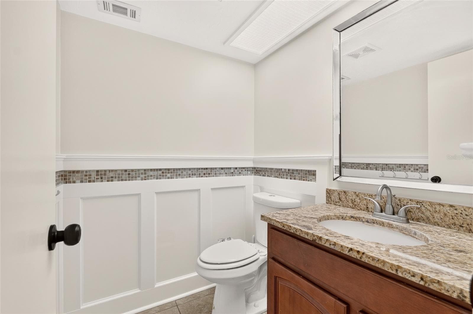 downstairs half bath - 4411 BLACK FOREST WAY, GAINESVILLE