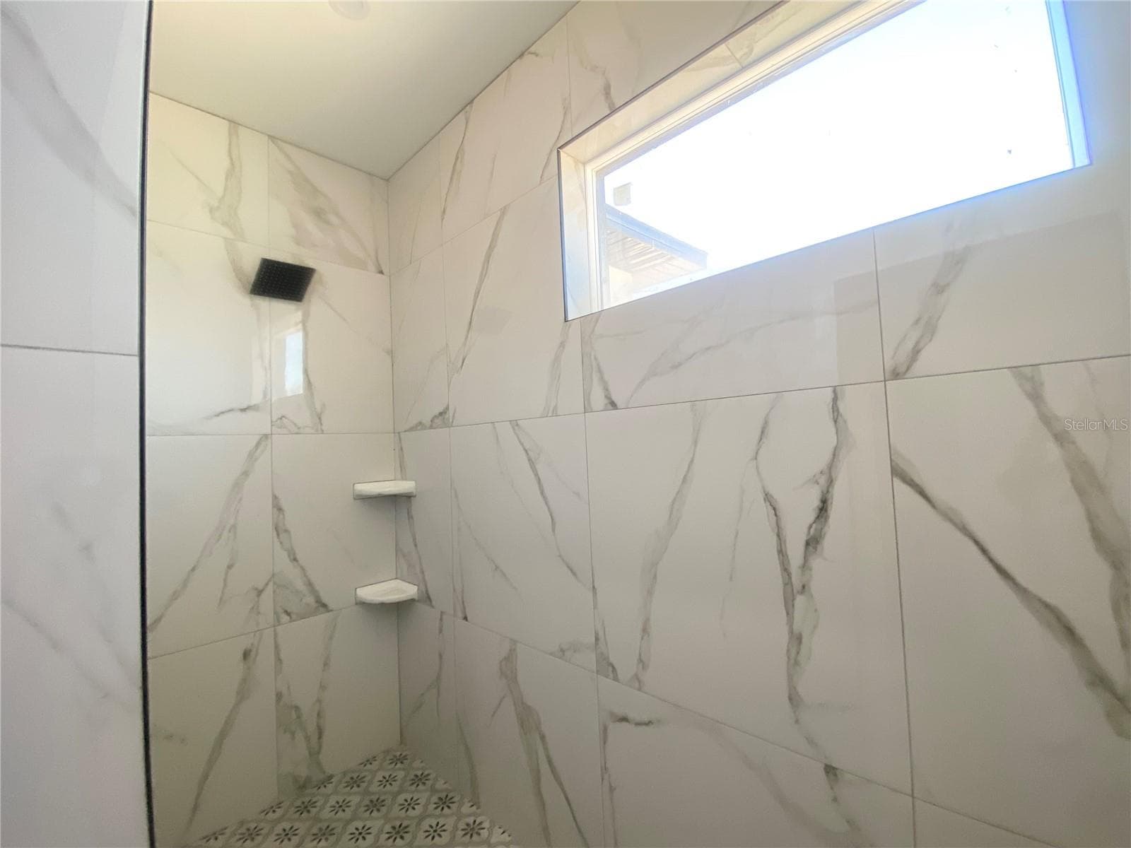 primary walk in shower - 410 CITROEN DR, SEBRING
