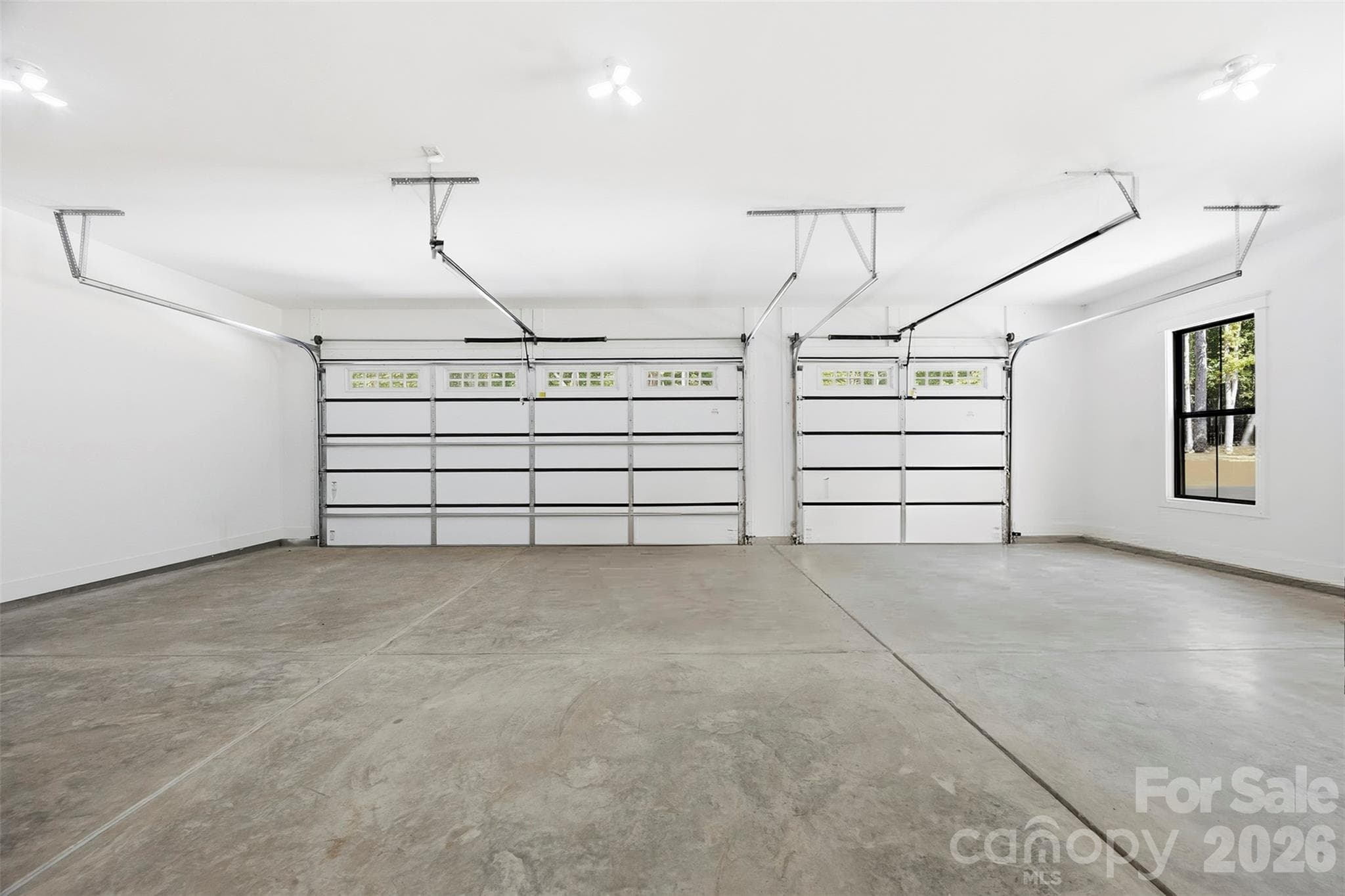 Three car garage. - 3515 Capricorn Road, Lancaster