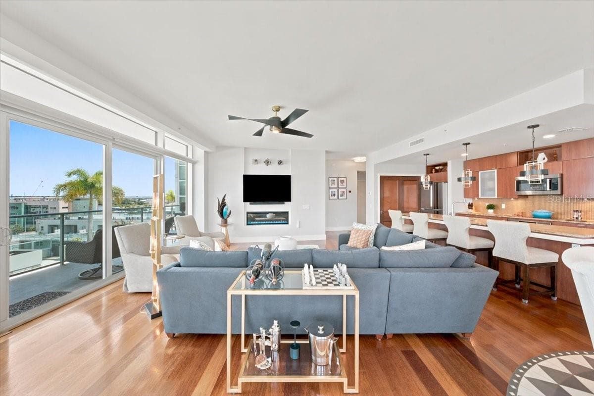 Beautiful wood flooring flows throughout the spacious main living areas. - 111 N 12TH ST #1704, TAMPA