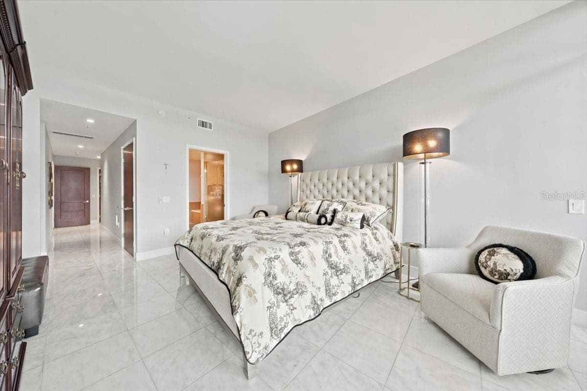 Generous proportions and abundant natural light create a relaxing primary suite. - 111 N 12TH ST #1704, TAMPA