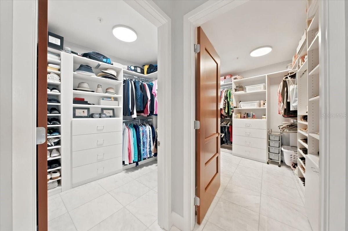 Two oversized custom walk-in closets provide impressive storage and organization. - 111 N 12TH ST #1704, TAMPA