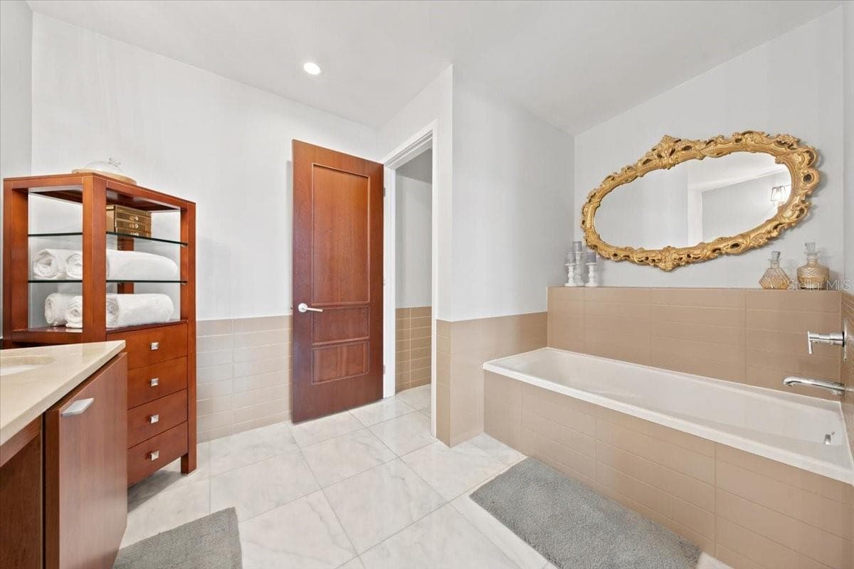 Elegant marble details create a luxurious and timeless atmosphere. - 111 N 12TH ST #1704, TAMPA