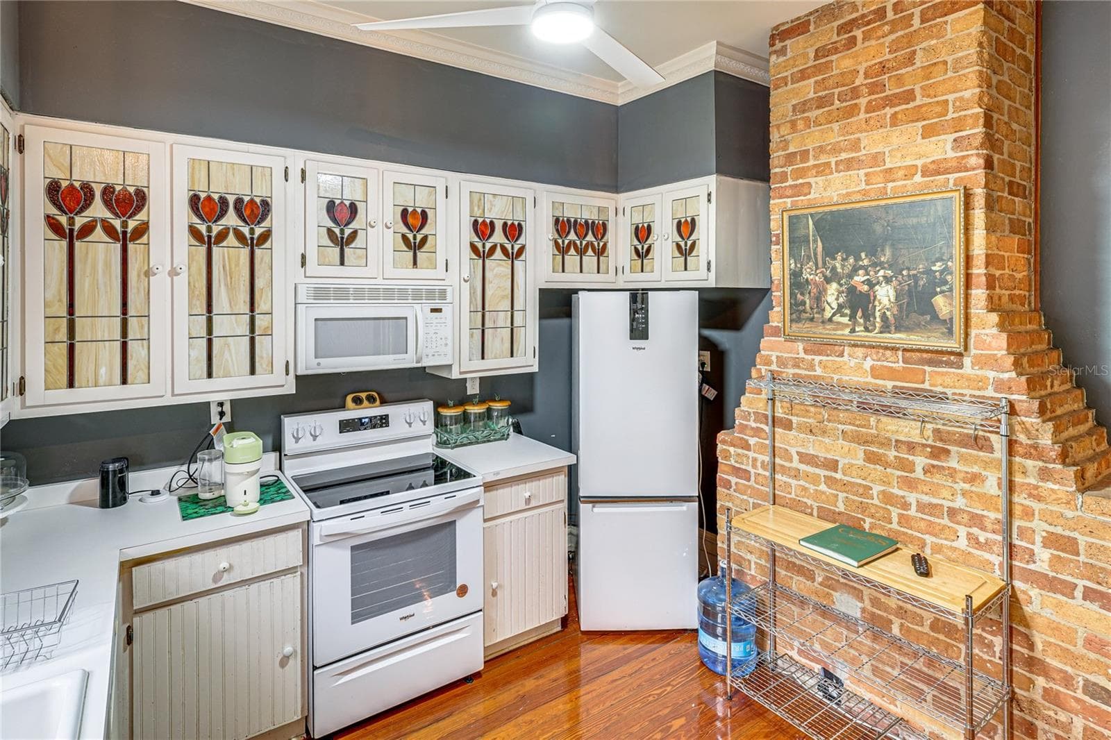Second Kitchen with Exposed Brick Detail - 743 E FORT KING ST, OCALA