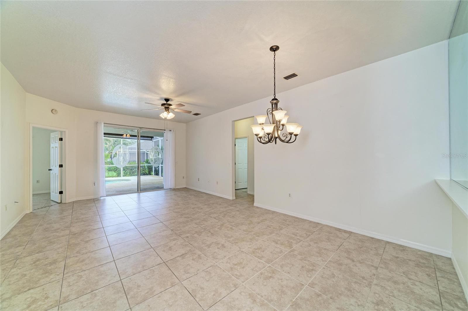 Combined living room/dining area - 1101 CANE MILL LN, BRADENTON