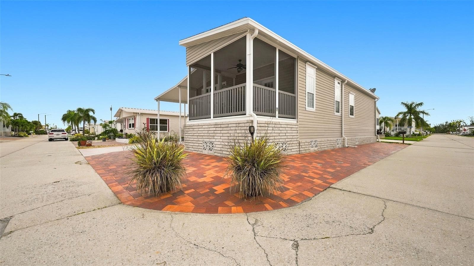 Brick pavers in front and on side offer additional parking for guests - 10315 CORTEZ RD W #2F, BRADENTON