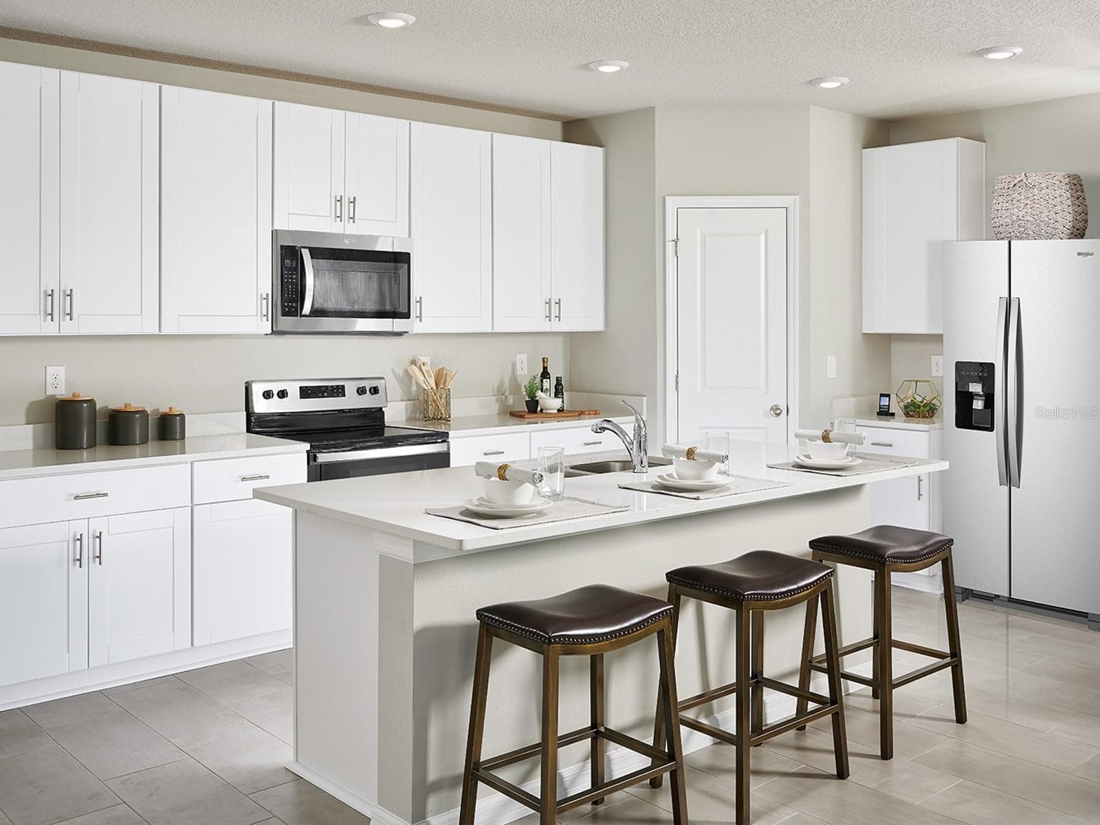 Photo is not of the actual home, but is an inspirational photo of builder’s model home and may depict options, furnishings, and/or decorator features that are not included. - 384 CASTLE DR, LAKE ALFRED