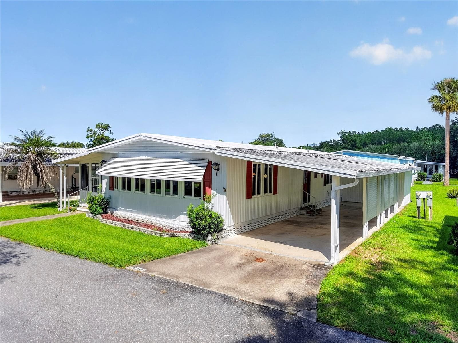 2 Car Carport - 210 PALM MEADOWS DR, EUSTIS