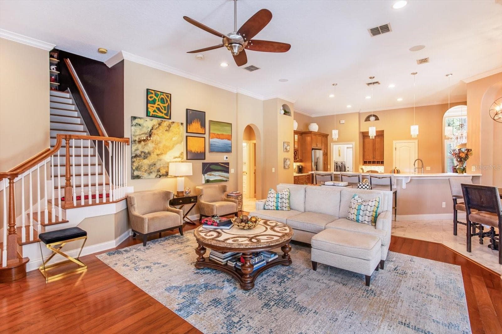 Family Room with view of kitchen and stairs to Bonus Rm - 1220 PRESTIGE PT, OVIEDO
