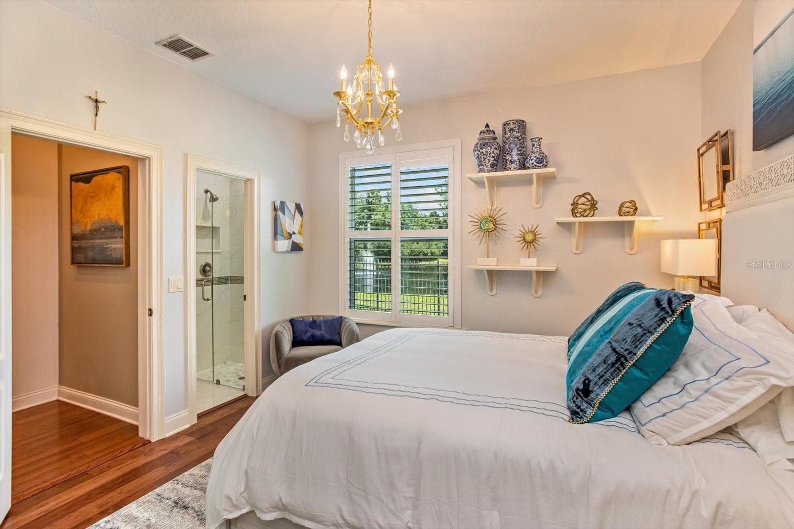 Bedroom 3 with Ensuite bathroom and view of Pond - 1220 PRESTIGE PT, OVIEDO