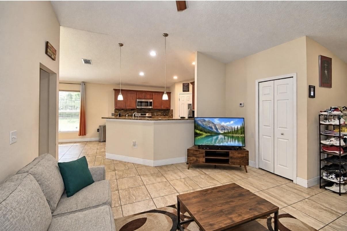 Single Family Residence at 2128 ORCHID WAY, POINCIANA, photo 5 of 46