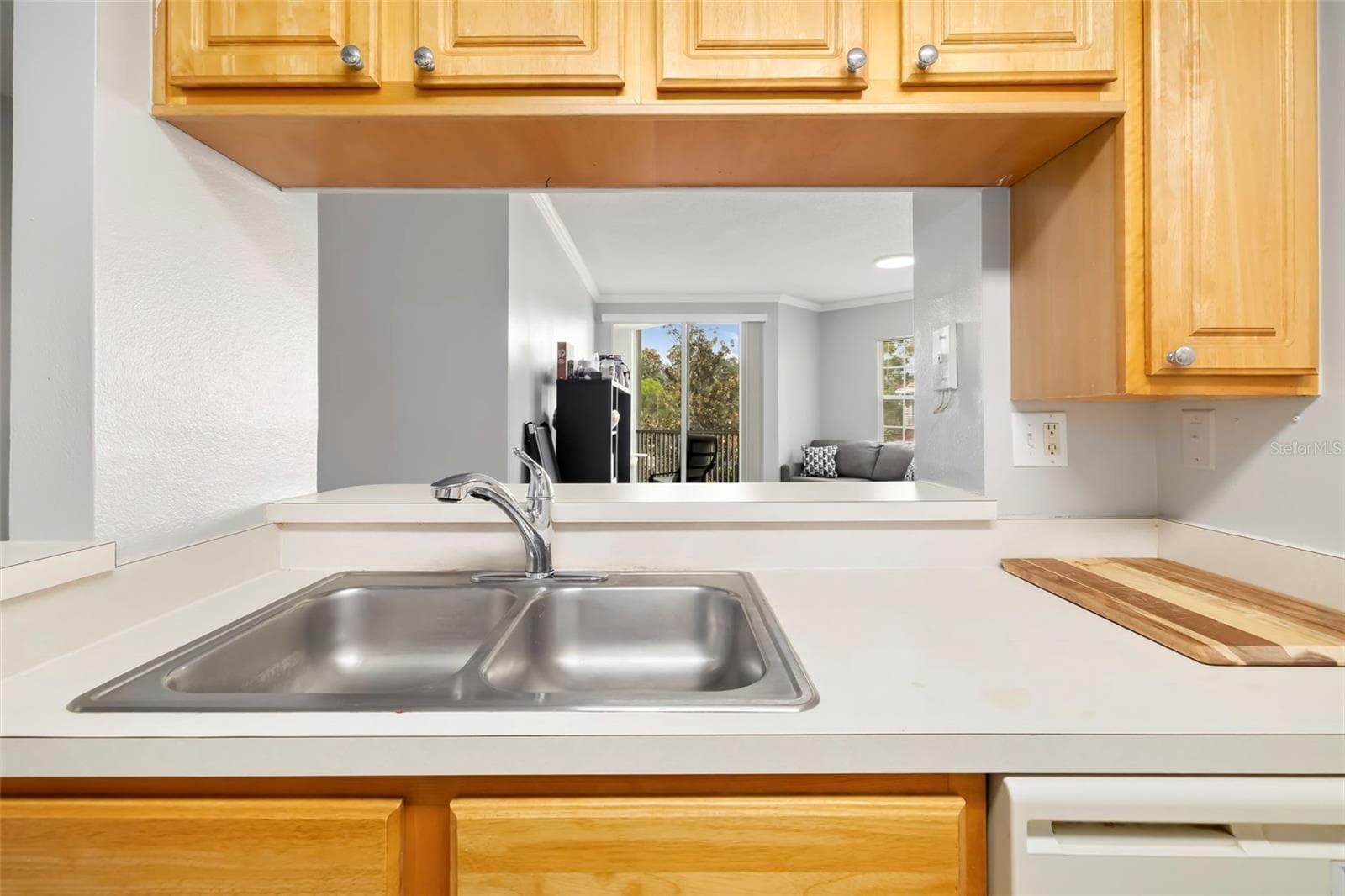 Kitchen to Living Room. - 5500 BENTGRASS DR #6-203, SARASOTA