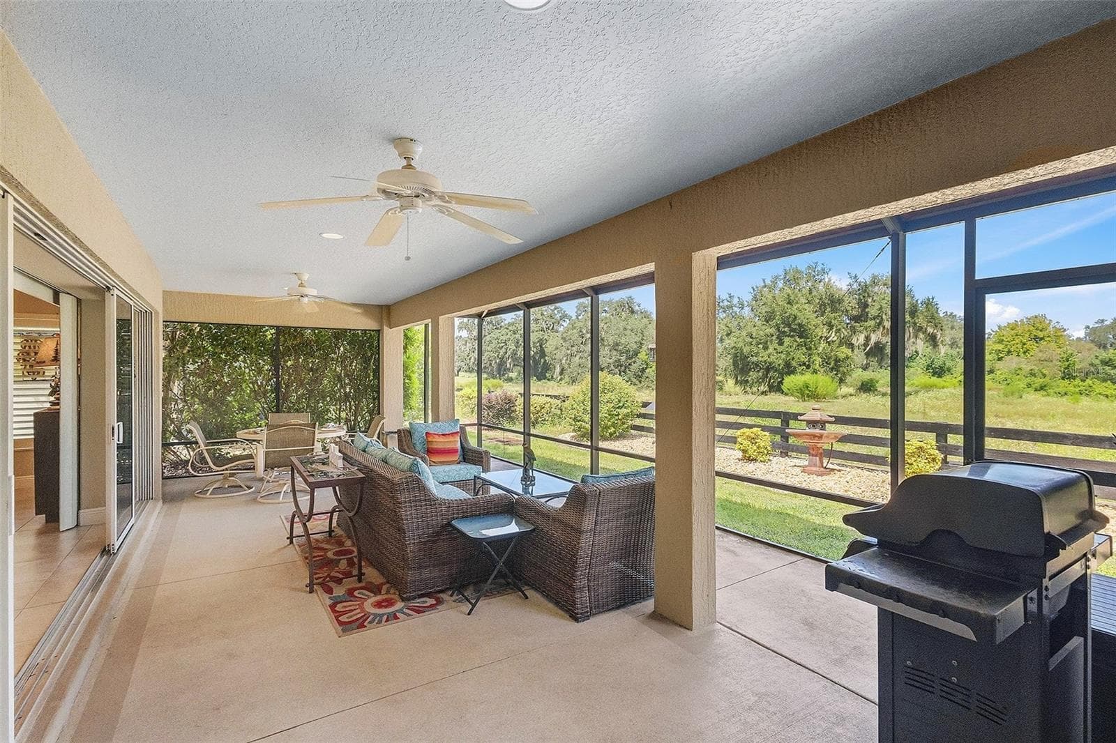 rear lanai - 1757 PENNECAMP DR, THE VILLAGES