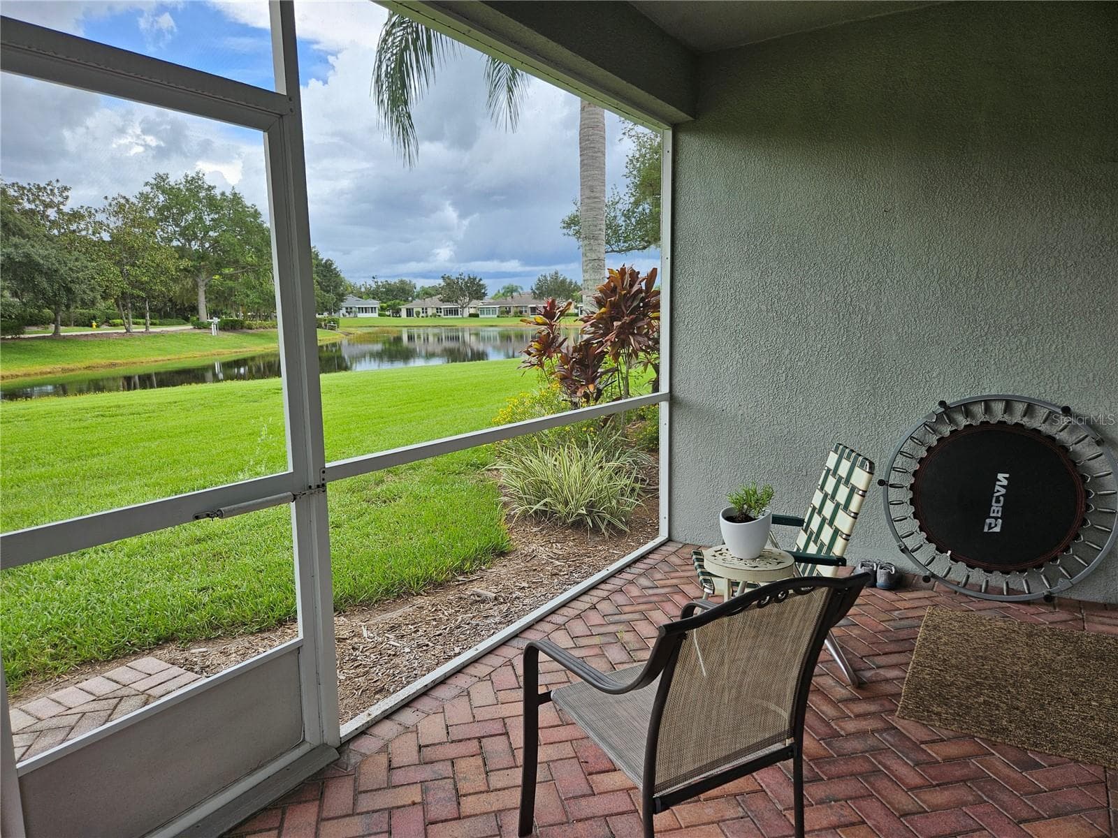 Water view from lanai - 1215 LYNDHURST GREENS DR #.000, SUN CITY CENTER