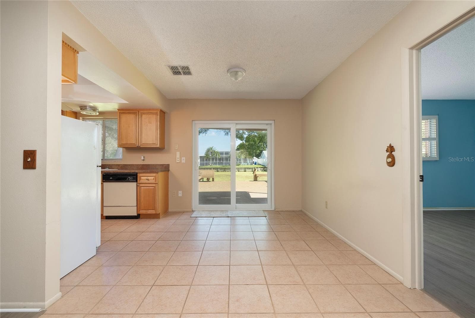 Dining Room overlooking the peaceful water - 6355 102ND TER N, PINELLAS PARK