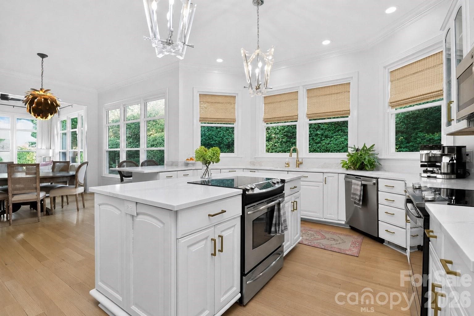 Open kitchen leading to breakfast area and 2nd den - 1901 Cortelyou Road, Charlotte
