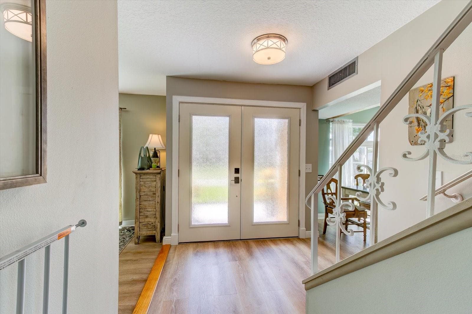 Updated front entry with new double doors - 116 PARTRIDGE CIR, WINTER SPRINGS