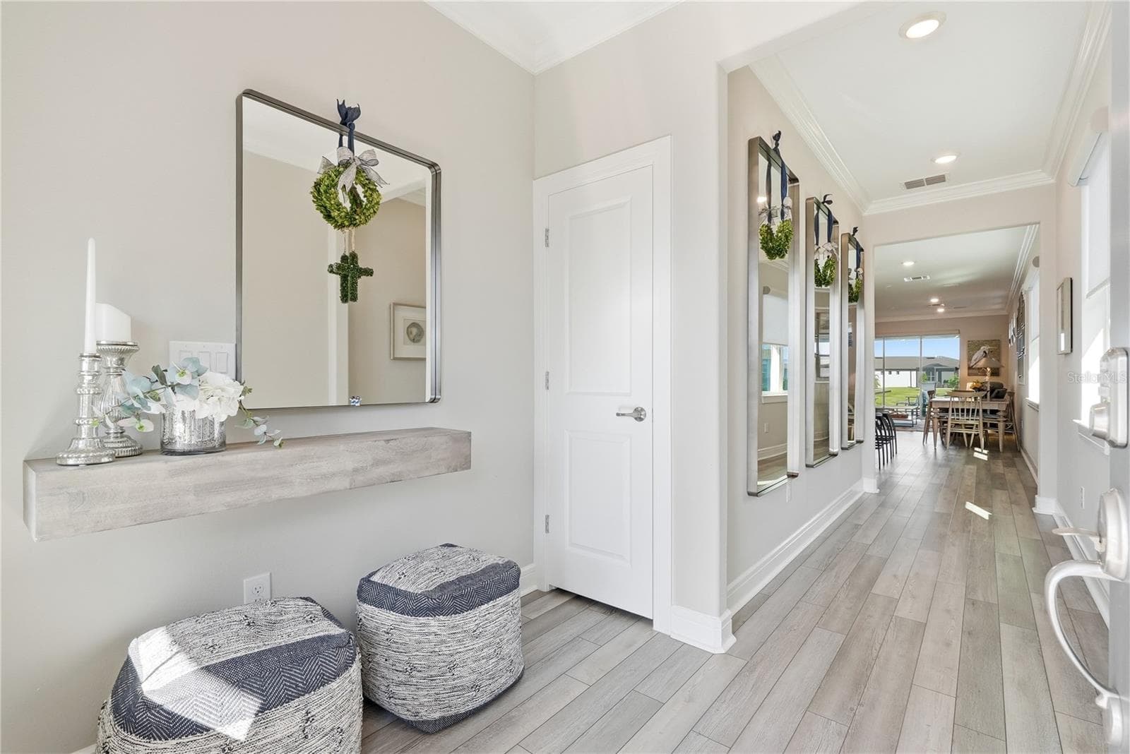 As you step inside you will notice the 9 foot ceilings and bright entrance. - 5535 BLUE CRUSH BND, LAND O LAKES